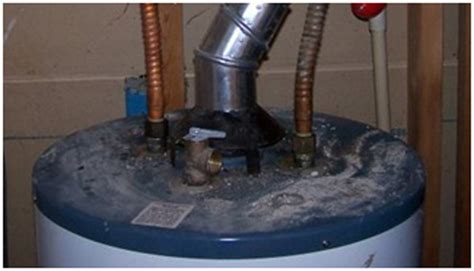 hot water heater leaking from top anode|Water Heater Leaking From The Top